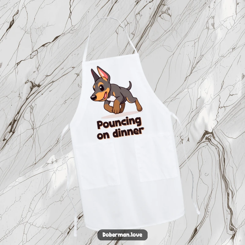 Funny Doberman puppy apron showing an energetic puppy in mid-pounce, ready to tackle kitchen tasks with humor and determination.
