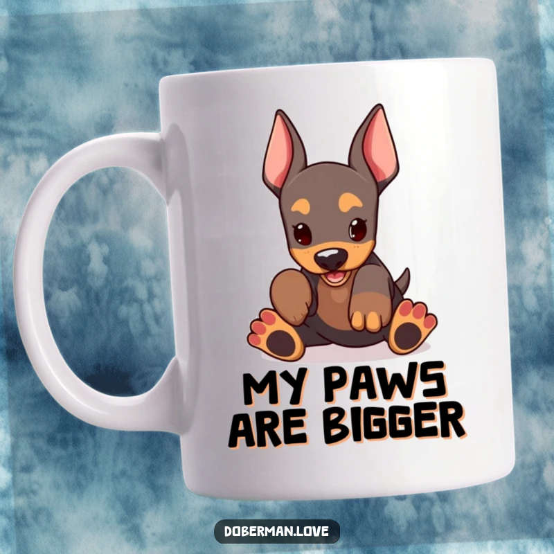 Funny Doberman Puppy Mug featuring a cute, clumsy doberman pup with giant paws, gleefully playing and ready to bring joy.