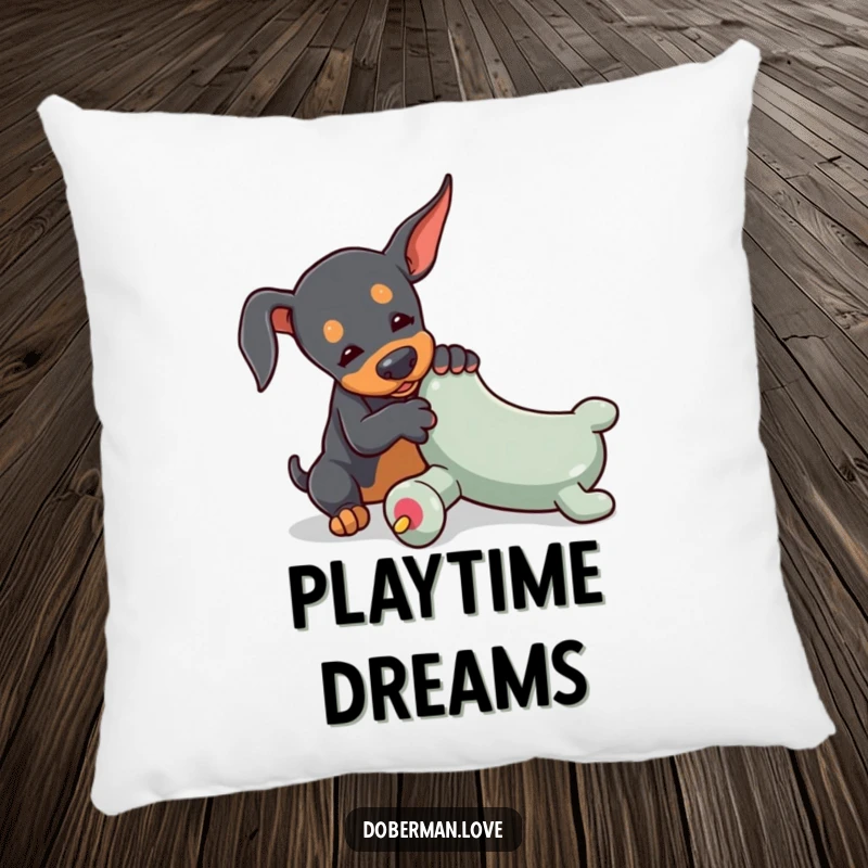Funny Doberman pillow featuring a tiny dog playfully wrestling with an oversized toy chew, adding comfort and endearing humor.