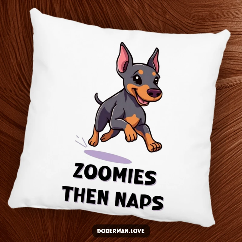 Funny little Doberman pillow with a sleek coat running with speed, offering comfort and humorous athletic charm.