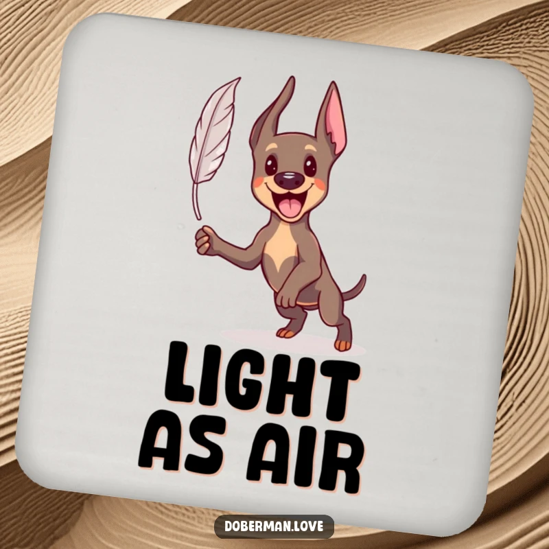 Funny Kawaii Doberman drink coasters showing an energetic dog pouncing at a feather, protecting surfaces with humor.