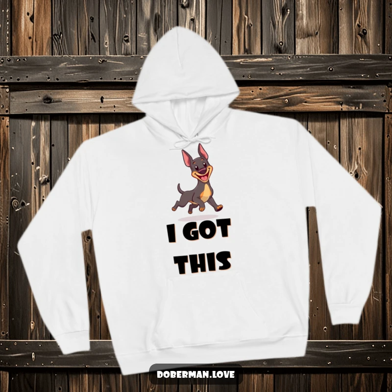 Funny Kawaii Doberman hoodie depicting a cheerful dog with a wide grin, hilariously chasing its tail in a circular motion, cozy and amusing.