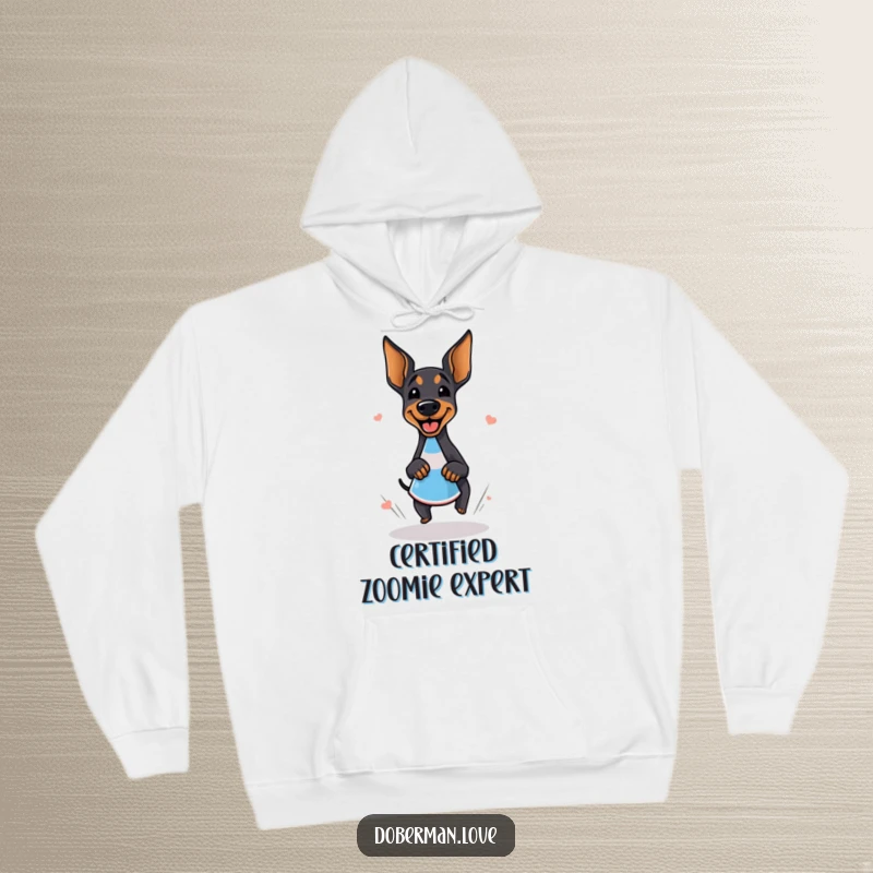 Funny doberman hoodie featuring a giggling dog in mid-zoomie around a cone, capturing a moment of pure, unadulterated canine bliss.