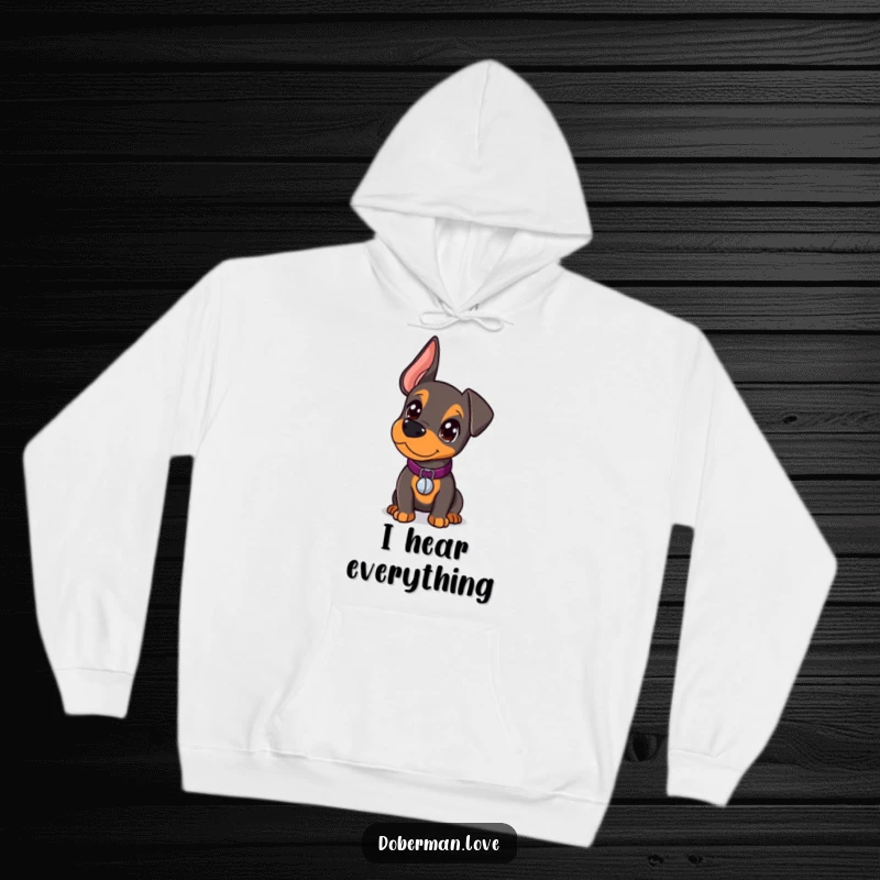 Funny Doberman Hoodie featuring a kawaii doberman pup with a tiny bell collar, looking curiously, offering warmth and charm.