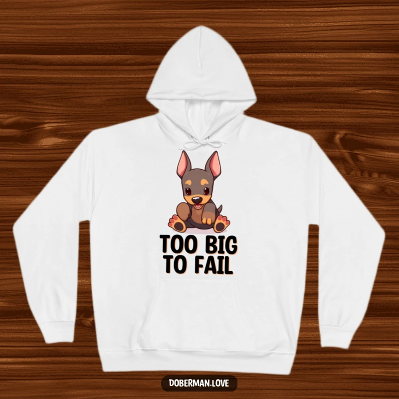 Funny Doberman Hoodie featuring a kawaii doberman puppy with oversized paws, excitedly playing, offering warmth and a dose of humor.