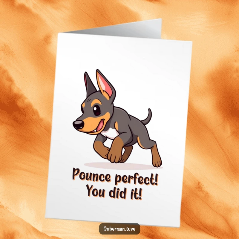 Funny free printable congratulations card showing a determined Doberman puppy executing a focused pounce, symbolizing reaching a goal.
