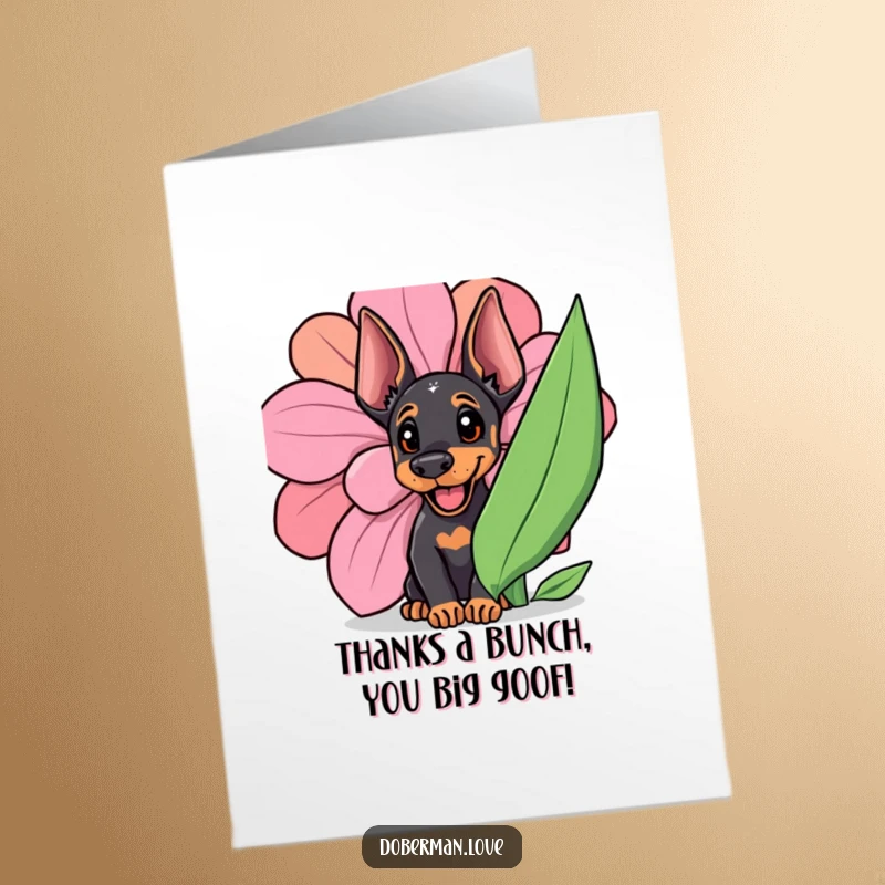 Funny Free Printable Doberman Thank You Card: A happy Doberman cub peeking from behind a large, vivid flower, expressing thanks.