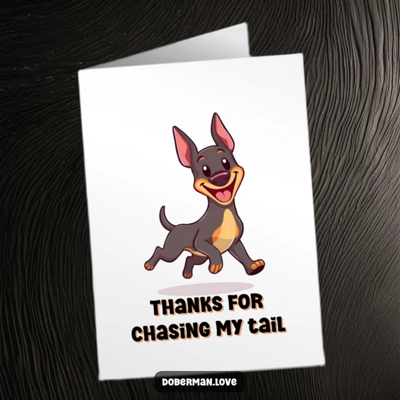 Funny Free Printable Thank You Card: Kawaii Doberman goofily chasing its tail, a perfect quirky thank you.