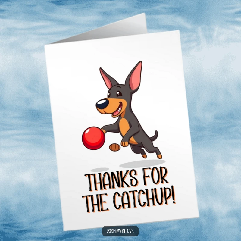 Funny Free Printable Thank You Card: Playful Doberman leaping to catch a shiny red ball, expressing thanks with joy.