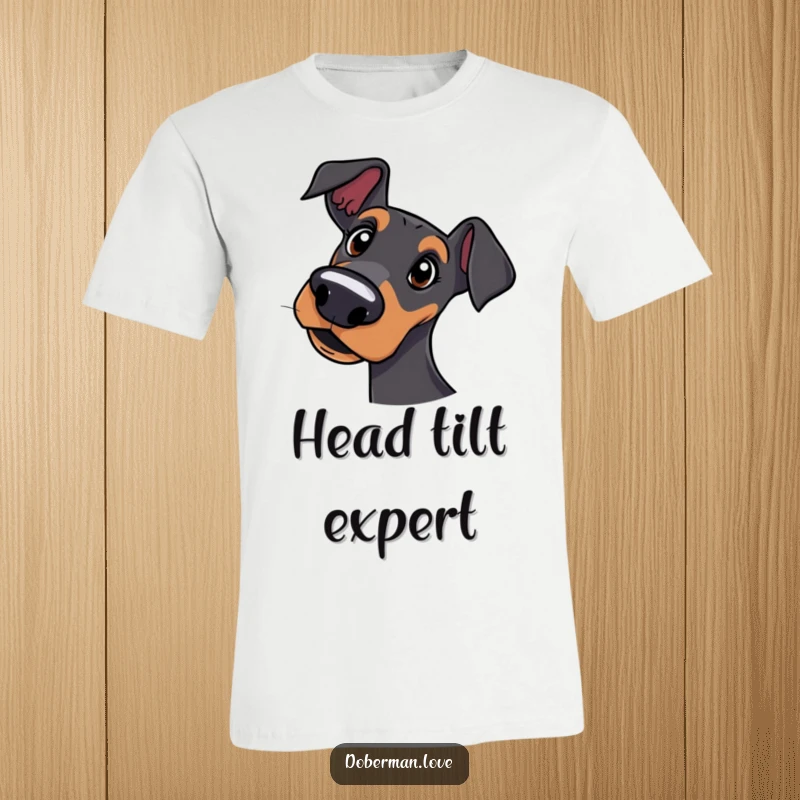 Funny t-shirt with a Doberman dog curiously tilting its head, displaying a quizzical and charming look.