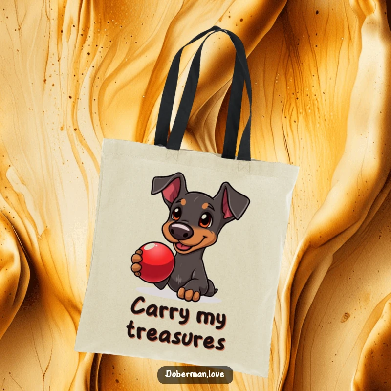 Funny Doberman tote bag showing a delighted dog with loving eyes, offering a shiny red ball, perfect for play.