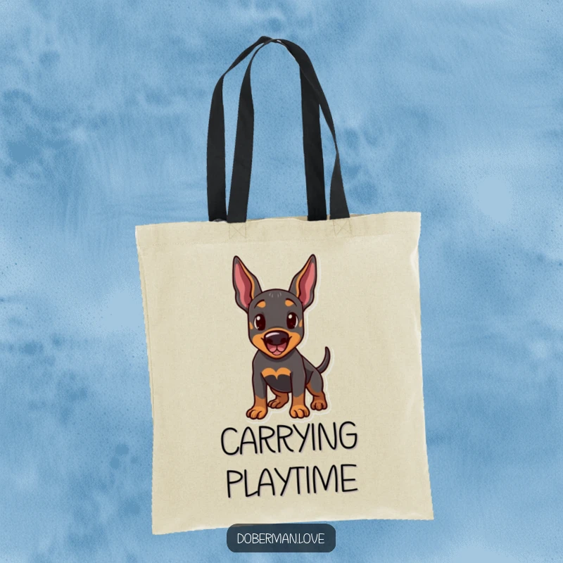 Funny tote bag depicting a Doberman dog in a playful stance, with perked ears and a wagging tail. A charming and humorous accessory.