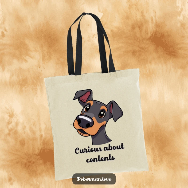 Funny tote bag showing a curious Doberman dog tilting its head with a quizzical and sweet expression.