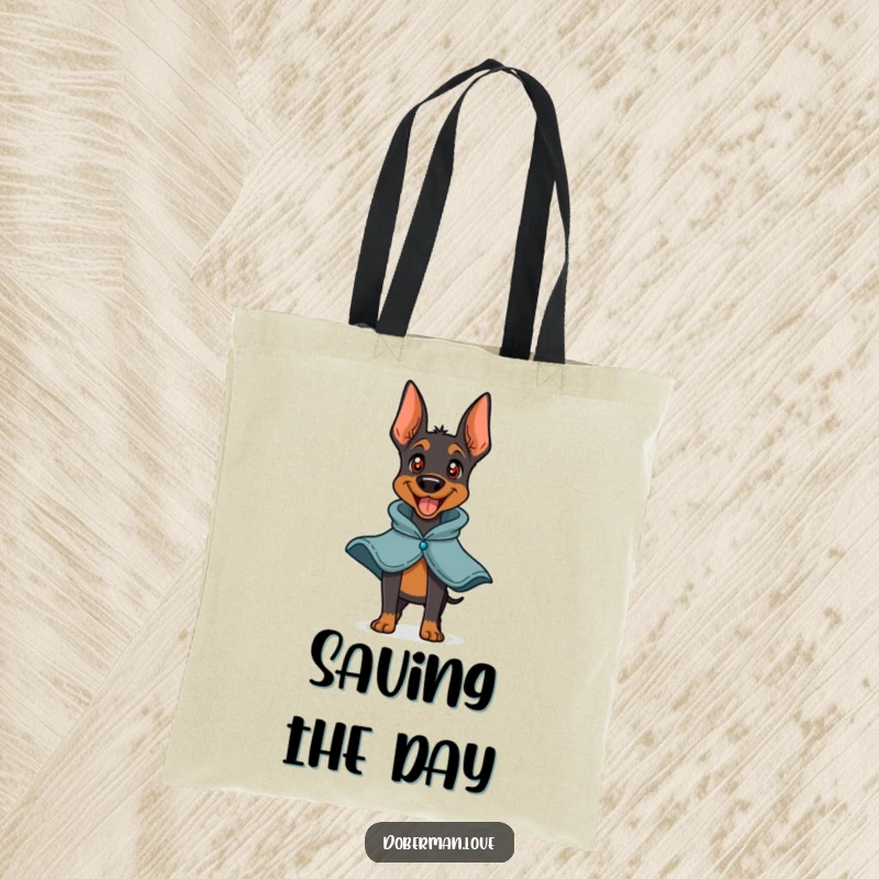 Funny Doberman Hero Tote Bag featuring a playful doberman barking happily with a small cape. Durable and fashionable, perfect for shopping and everyday use.